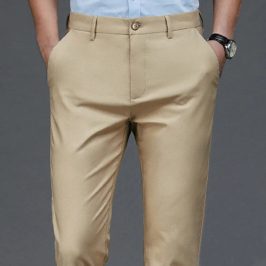 Pantalon Homme Stretch Noir – Style Smart Casual | Bureau & Quotidien
Tailles : 30 à 38 (EU)
Matière : tissu stretch confortable, séchage rapide
Coupe : droite, ajustée sans être trop serrée
Saison : printemps et aut FelizShop