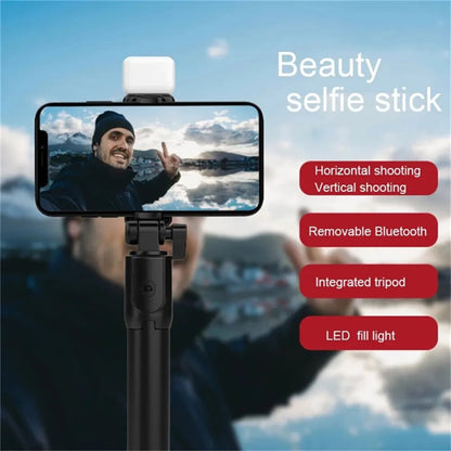 Perche à Selfie Bluetooth Portable avec Trépied – Télécommande Sans Fil, Lumière d’Appoint, Support Téléphone Rétractable et Extensible 🚚 Livraison rapide en 8 à 12 jours ouvrés depuis la France ou nos entrep FelizShop